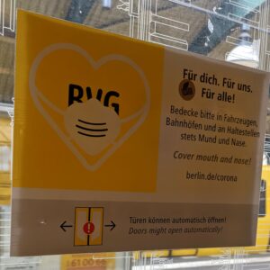 poster BVG untuk mengingatkan penggunaan masker